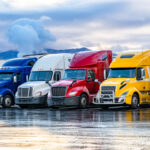 Heavy trucks parked in lot