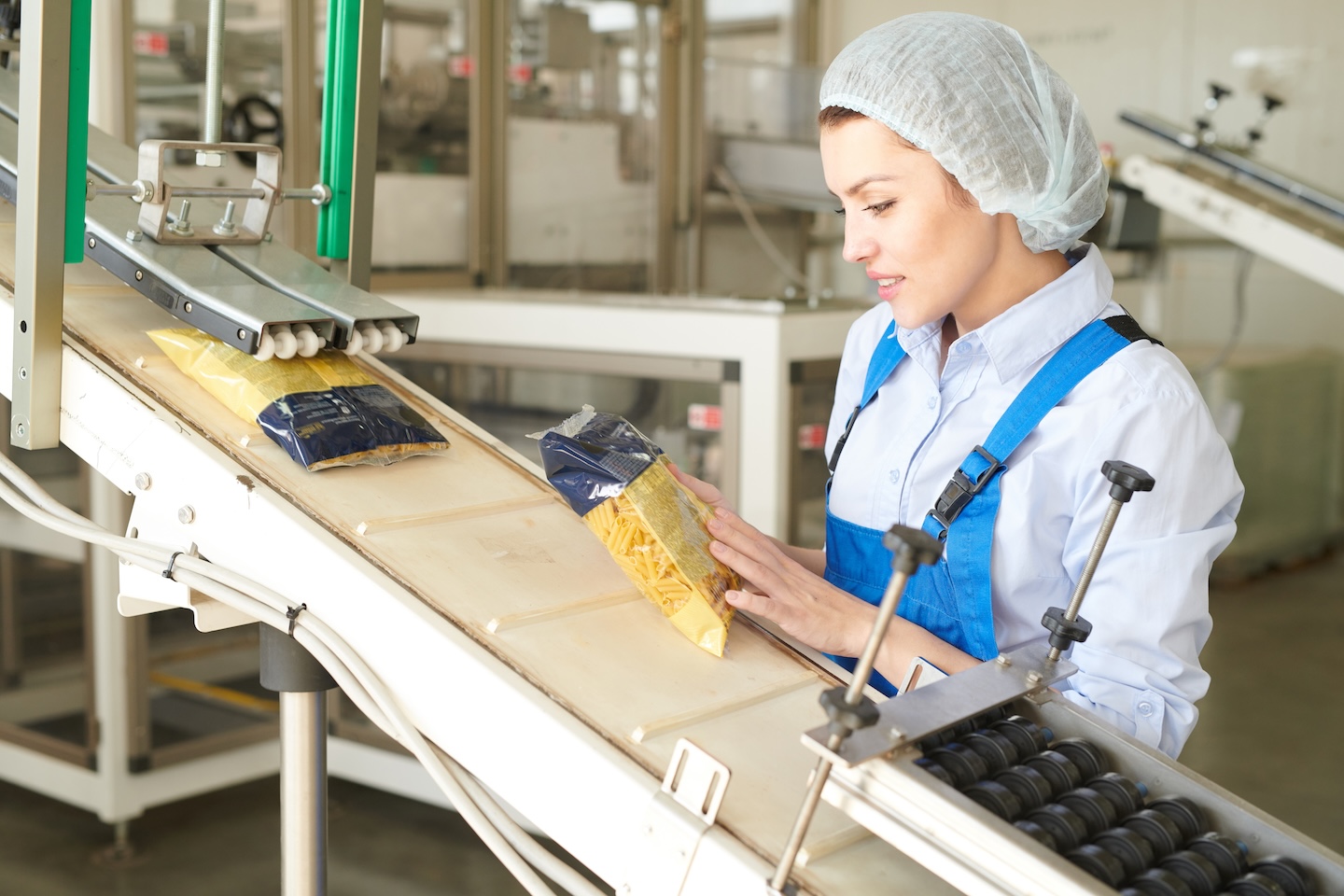 Young  Woman Working at Packaging Line
