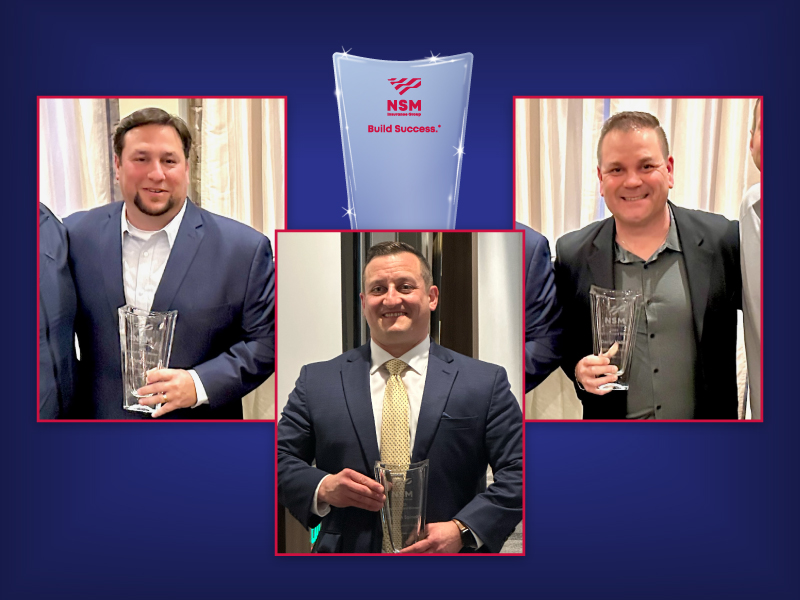 Brett Kirsch, Joseph Spinelli and Darryl Vadell holding their crystal awards.
