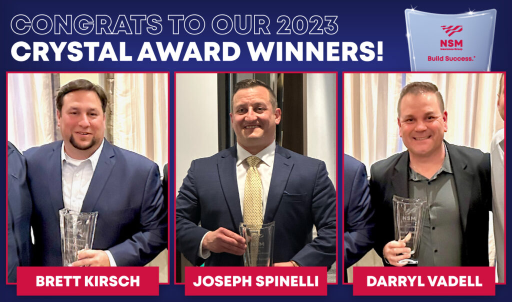 Brett Kirsch, Joseph Spinelli and Darryl Vadell holding their crystal awards.