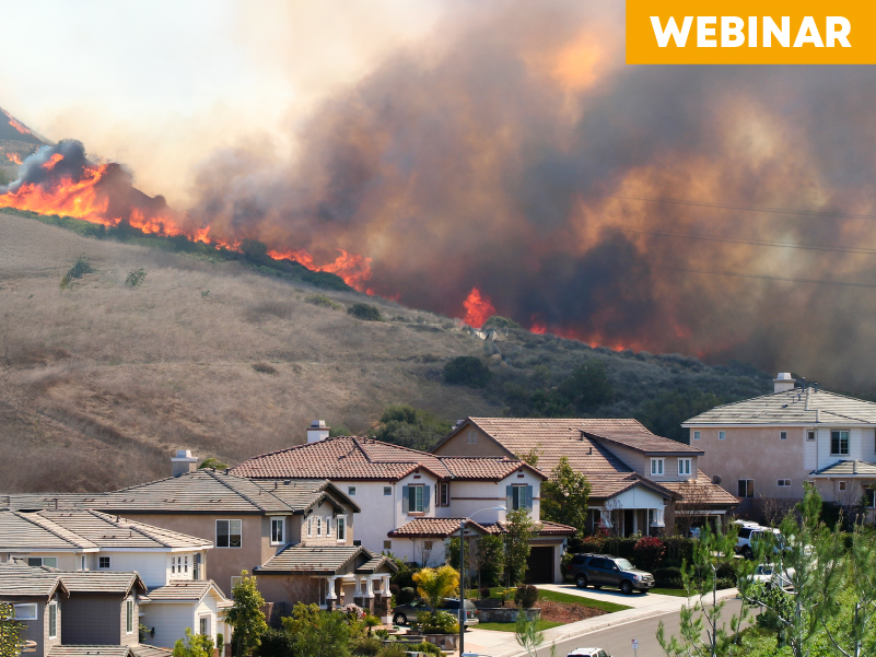 California wild fire burning on hilltops around neighborhood