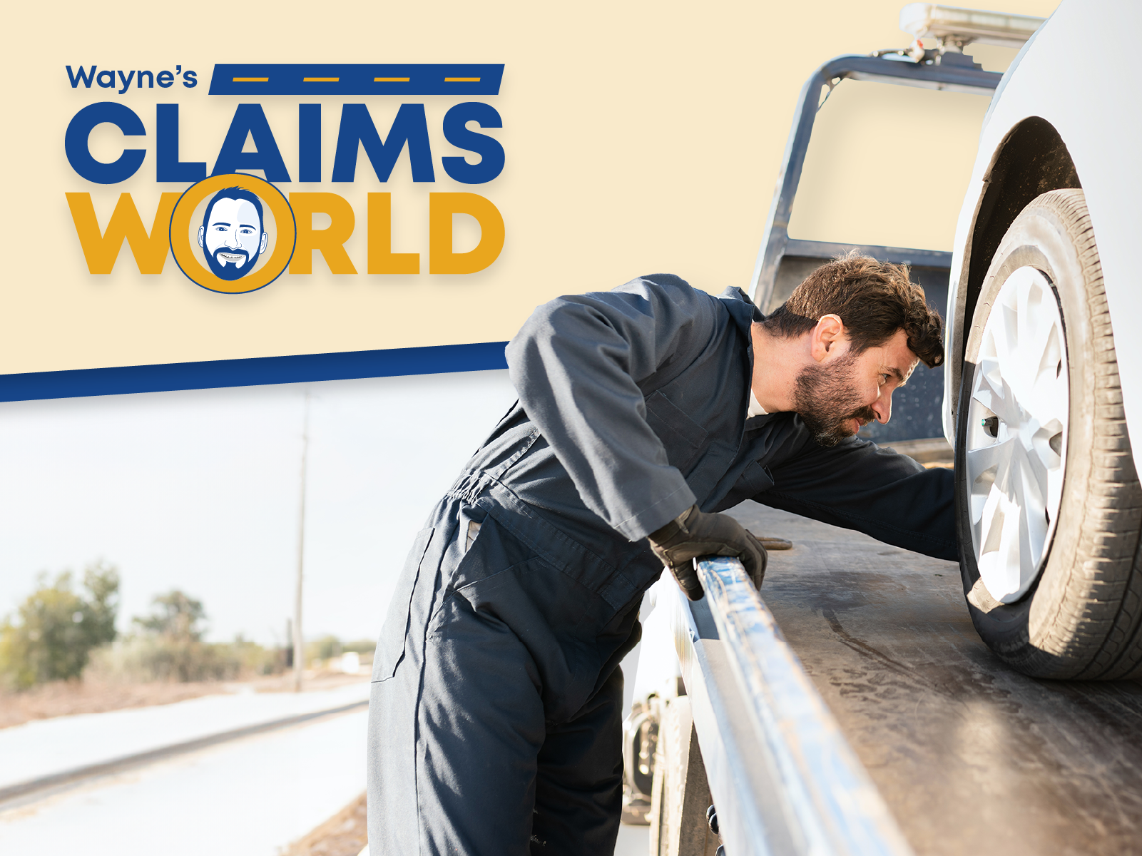 Wayne’s Claims World logo, photo of tow truck operator loading a car on a tow truck
