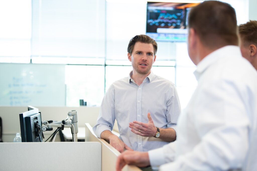 Davis Howley talking to other team members