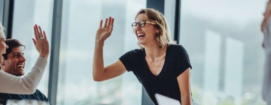 woman high fiving her team