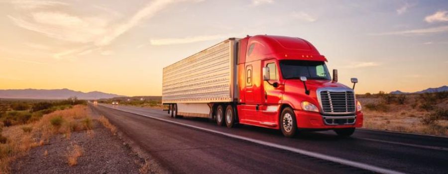 NSM-TTI-resources-making-occupational-accident-and-workers-comp-work-together-420x160@2x image of a tractor trailer writing down the highway